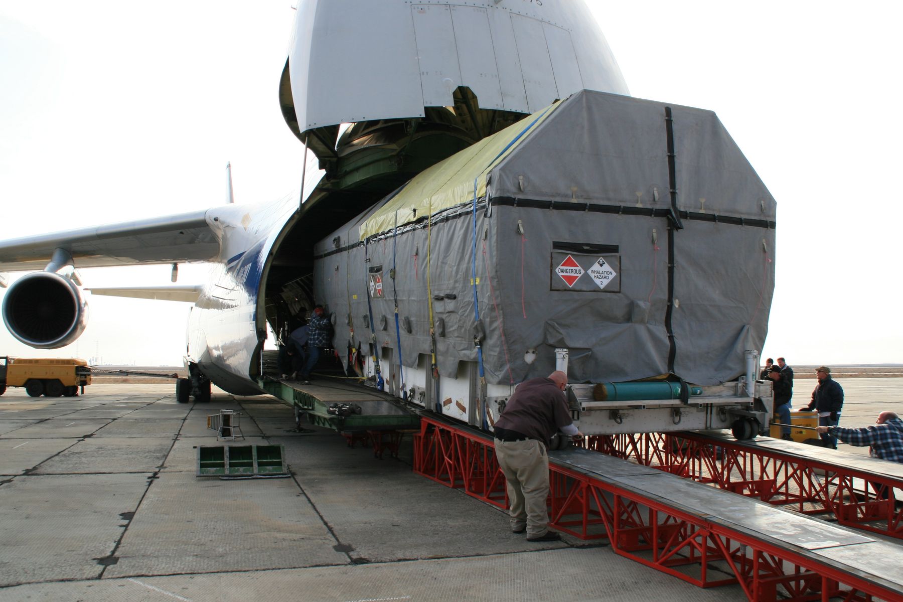 Placarded dangerous-goods cargo unit prepared for transport