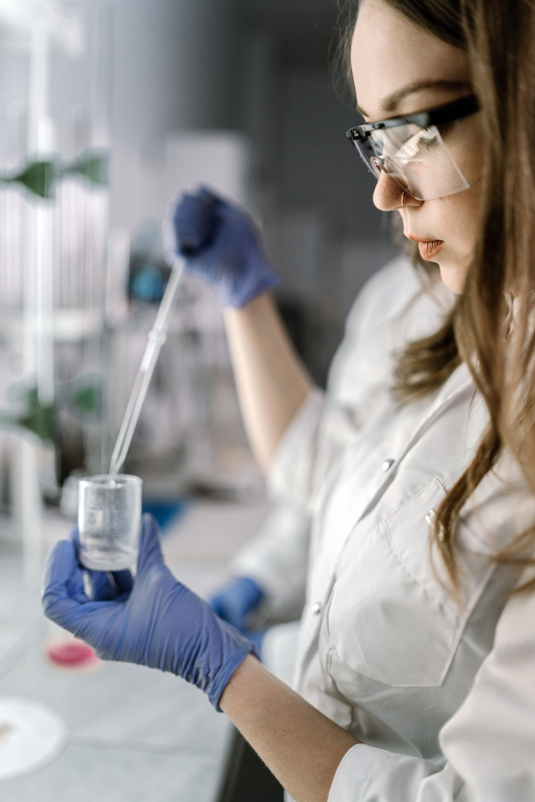 Technician performing quality analysis in a laboratory
